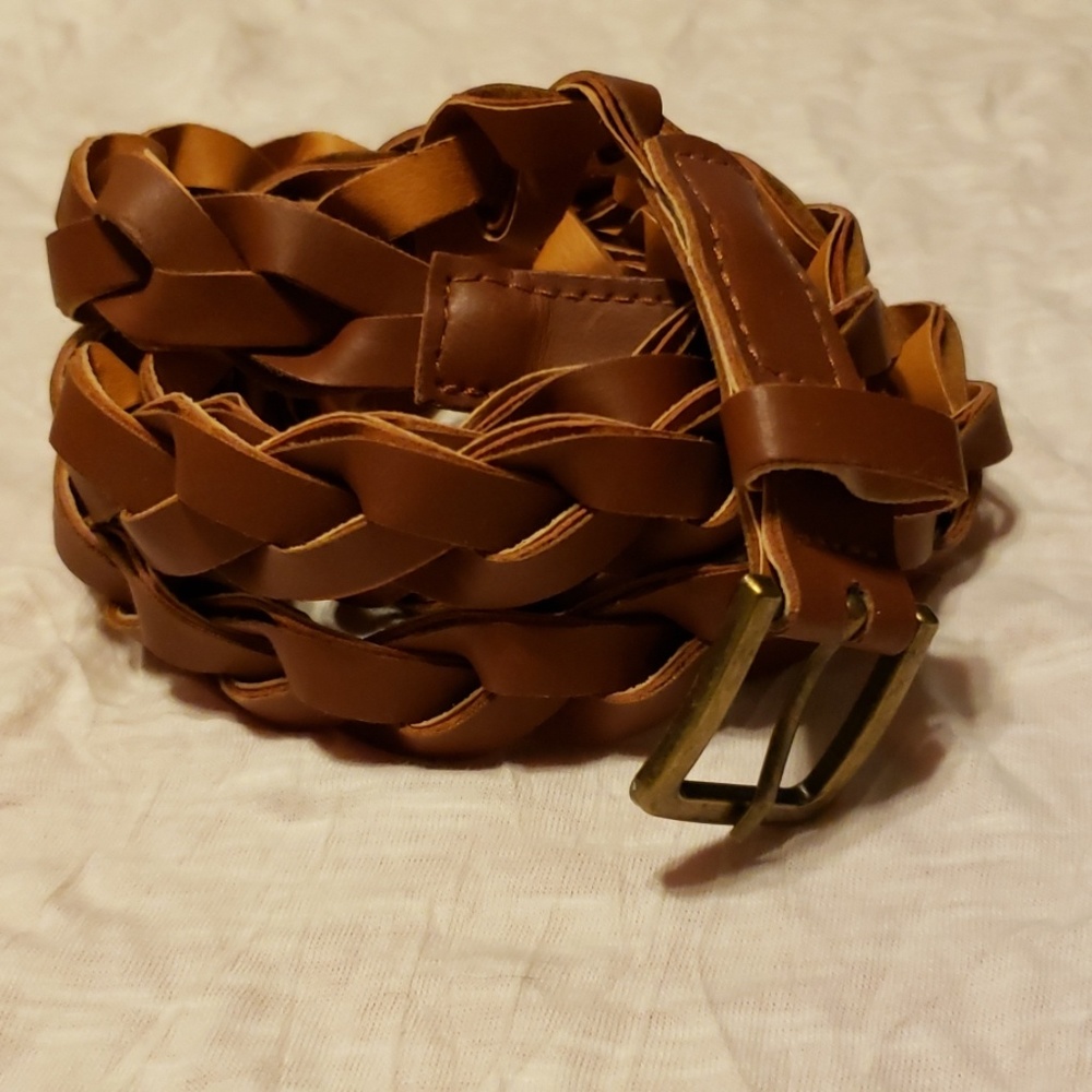 Brown braided belt. Faux leather